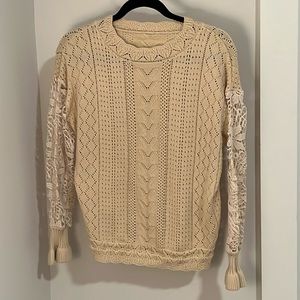 Light beige sweater with lace sleeves